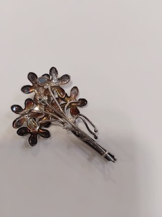 Broche ramo flores plata