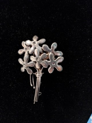 Broche ramo flores plata