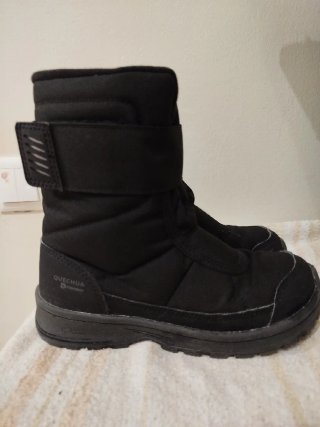Botas pretas para menina