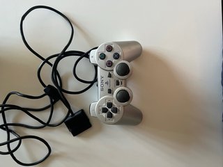 PlayStation 2 Slim con 2 mandos