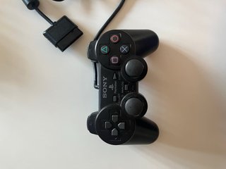 PlayStation 2 Slim con 2 mandos