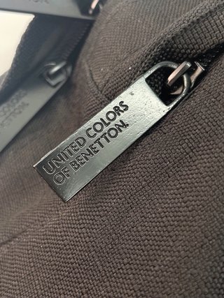 Bandolera de Benetton sin uso.