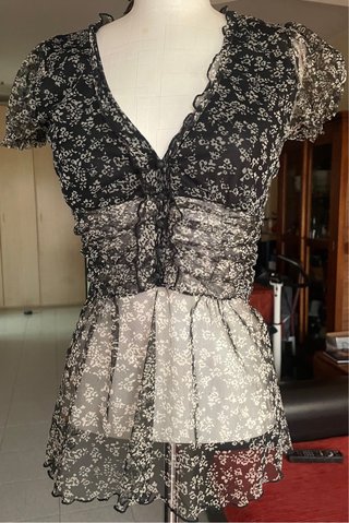 Blusa in chiffon a fiori