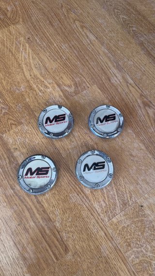 Set de 4 Tapabujes MS Motor Sports 56mm