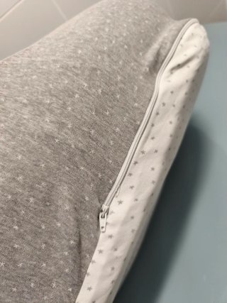 Reductor de cuna gris con estrellas