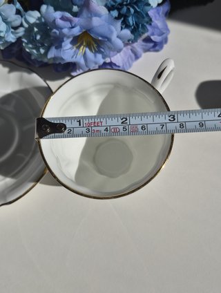 Taza y platillo porcelana inglesa dorada