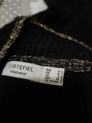 Jersey Cortefiel negro con detalles brillantes Tal