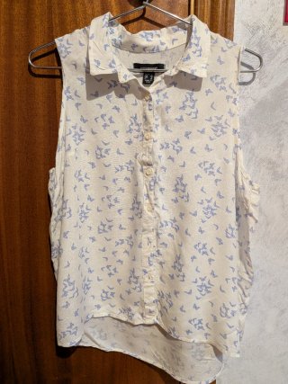 Blusa sin mangas con estampado de mariposas