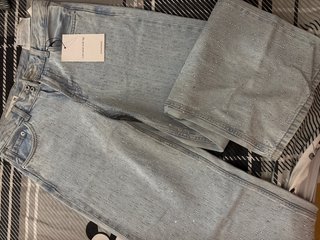 Pantalones vaqueros anchos con pedrería