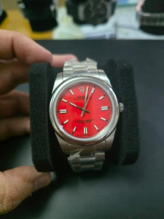 Reloj Rolex Oyster Perpetual Rojo