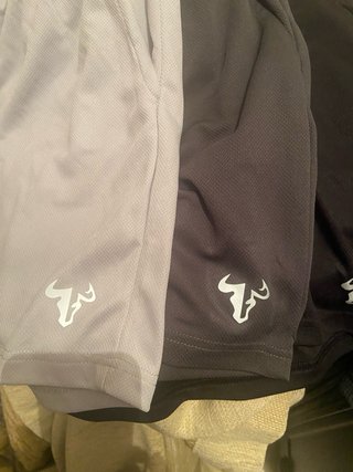 Pantalones cortos grises y negros (bajada de preci