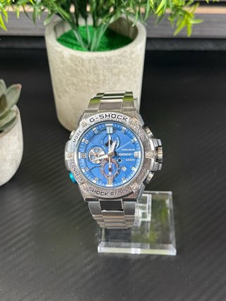 Reloj Casio G-Shock B100 Plateado y Azul