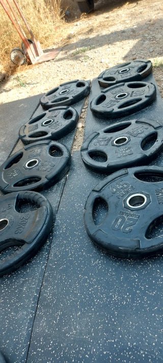 Lote Gimnasio profesional 855kg Discos Olímpicos