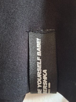 Falda negra corta plisada XS Bershka