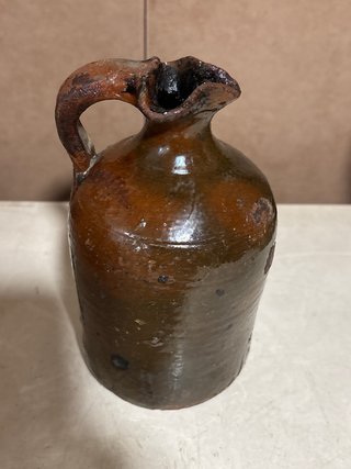 Aceitera antigua de barro