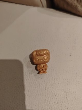 Muñeco Kinder Harry Potter Dorado