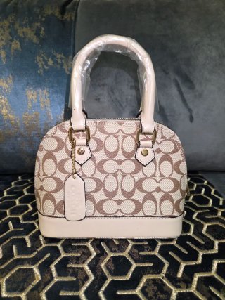 Bolso de mano coach beige