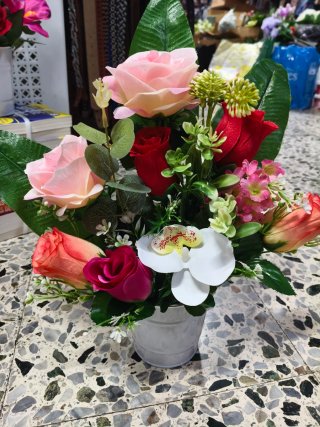 Flores artificiales para cementerio