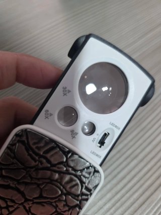 lupa óptica portátil