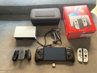 Nintendo Switch OLED + complementos negociable