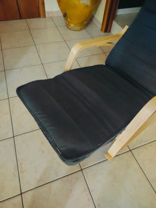 Poltrona a dondolo grigia