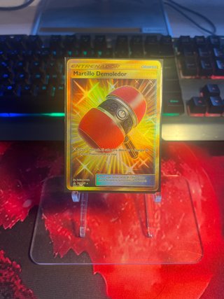 Carta Pokémon Martillo Demoledor (Oro)