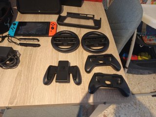 Nintendo Switch con caja y accesorios