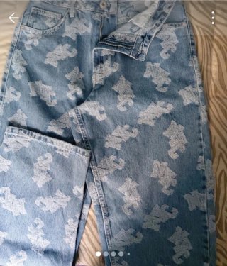 Pantalón vaquero ancho estampado mujer