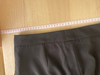Pantalones de traje negros con bolsillos
