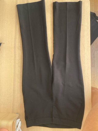Pantalones de traje negros con bolsillos