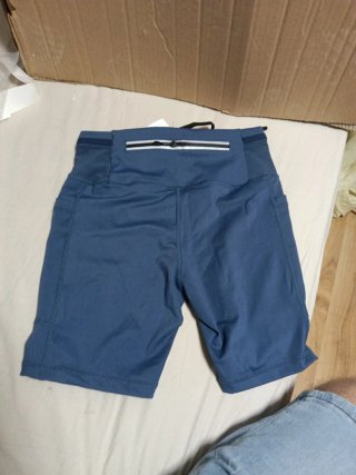 Malla corta running/ciclismo con bolsillos