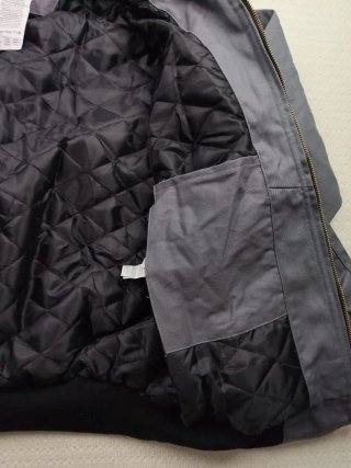 Chaqueta Carhartt con capucha gris y negra