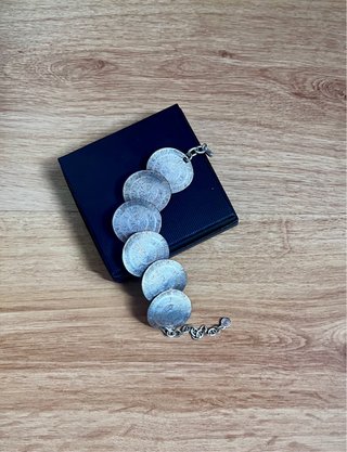 Pulsera de eslabones circulares plateada