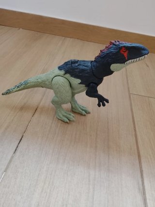 Dinosaurio de juguete marca Real