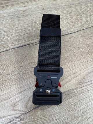 Cinturón negro de nylon con hebilla liberación ráp