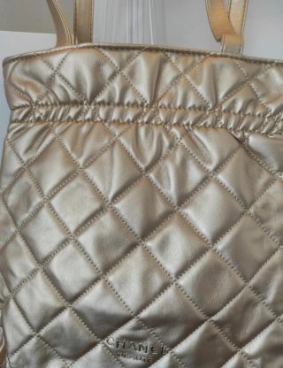 Pochette Chanel oro