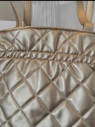 Pochette Chanel oro
