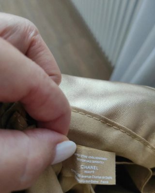 Pochette Chanel oro