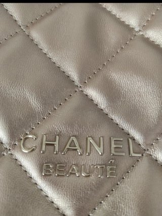 Pochette Chanel oro