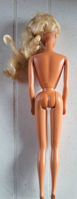 Barbie mattel con vestito arancione e top argento