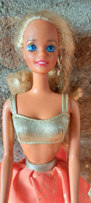 Barbie mattel con vestito arancione e top argento