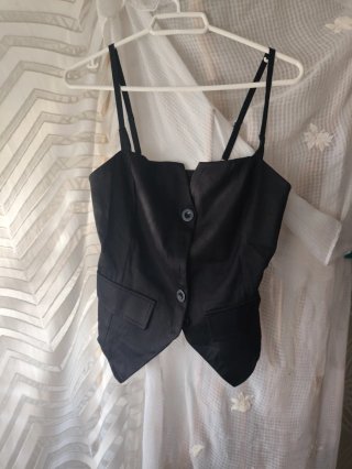 Top negro con botones y bolsillos xs nuevo