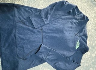Sudadera The North Face azul y verde