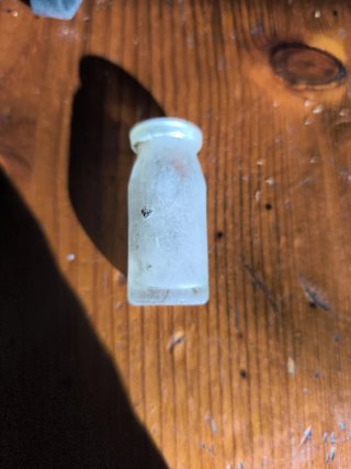 Frasco de vidrio antiguo