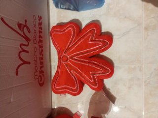 Fermaporta a forma di fiocco rosso