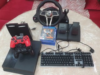 PS4 (PlayStation 4) con accesorios