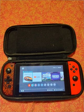 Nintendo Switch con Funda y juegos