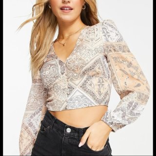 Blusa satinada estampada manga larga