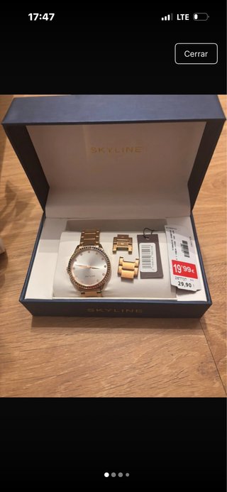 Reloj SKYLINE dorado y plateado