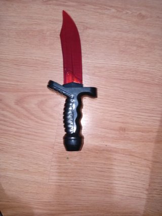 Cuchillo de Halloween de plástico rojo